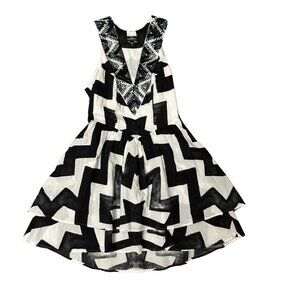 NWOT bebe Black and White Ruffled Bottom Dress with a Beaded V-Neck